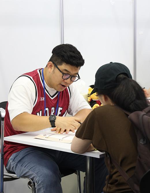 A staff member in a counseling session.